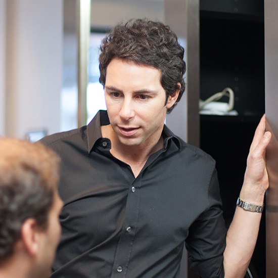Portrait of Sacha, top stylist at Safar Salon Boston, specializing in modern cuts, balayage, and luxury color services.