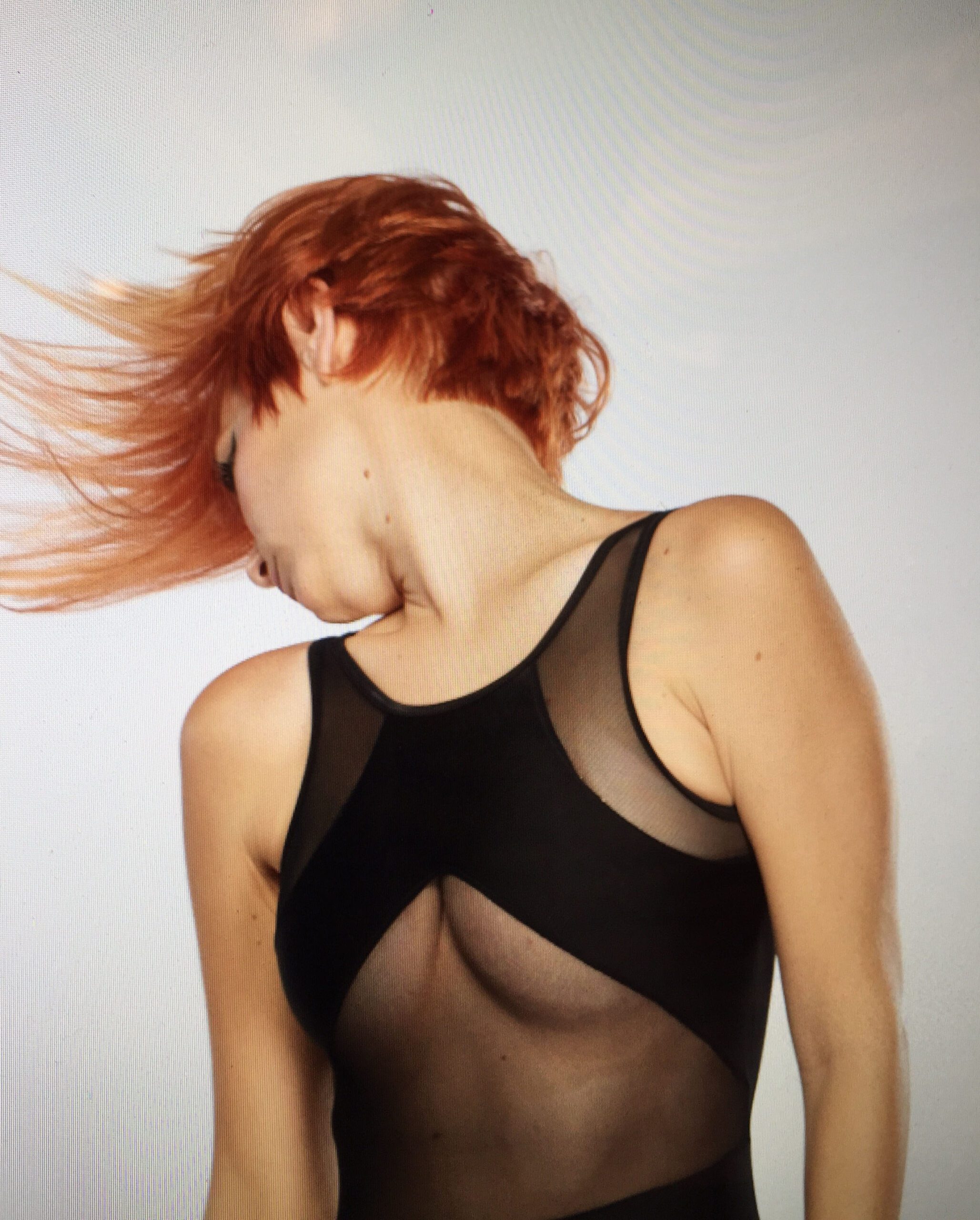 Modern hairstyle with red hair at SAFAR Salon Boston on Newbury Street