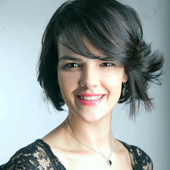 Sonila, senior stylist at Safar Salon Boston on Newbury Street, known for short haircuts and precision styling.