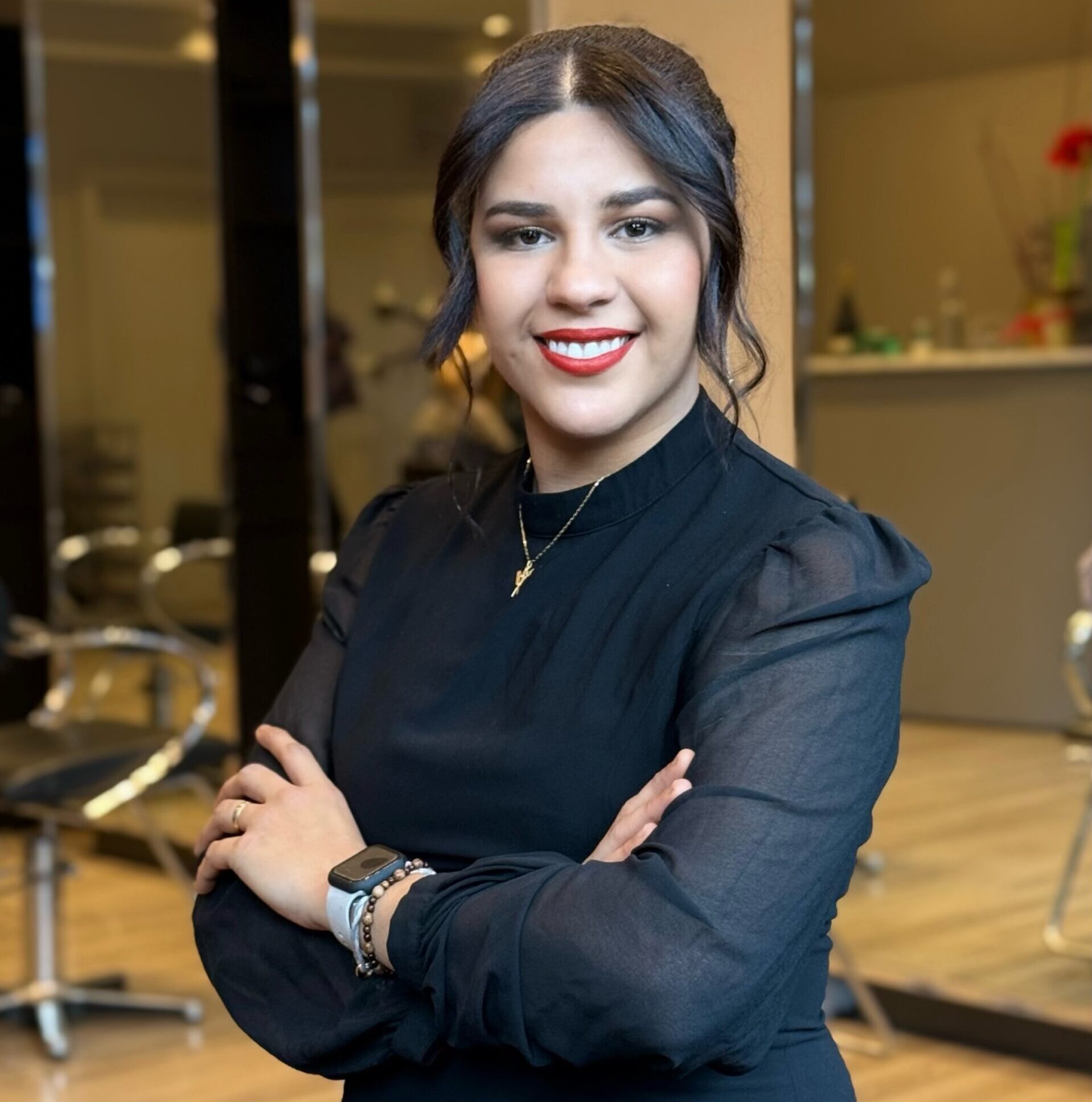 Carol, stylist at Safar Salon Boston on Newbury Street, offering precision cuts and timeless elegance.